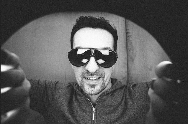 DEEP UNIT in black and white, wearing sunglasses